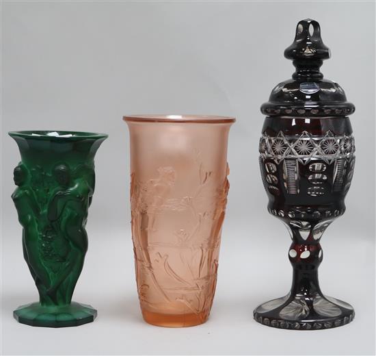 A malachite vase, a Deco vase and an overlay vase and lid